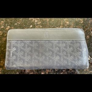 Goyard women’s long zip wallet.